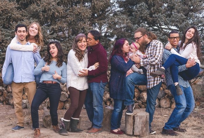 group of family with multiple generations playing for the camera