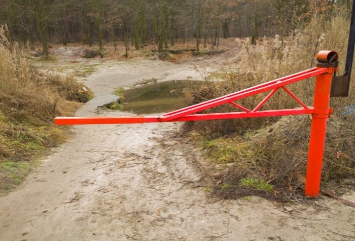 picture of a barrier leading onto a beach