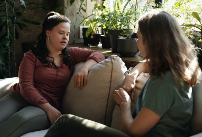 a woman with down's sundrom talks to a therapist