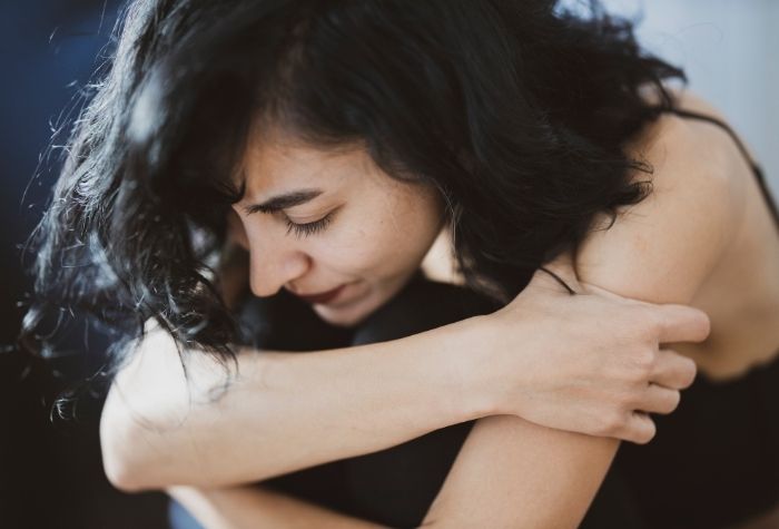 young woman looking sad depressed