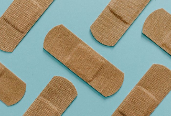 bandages on a blue background