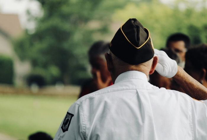 veteran saluting in uniform